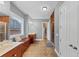 Spacious bathroom boasts double sinks, a built-in vanity, and a walk-in shower at 4916 Locklear Way, Marietta, GA 30066