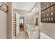Bright bathroom features double sinks and countertop space and neutral wall color at 4916 Locklear Way, Marietta, GA 30066