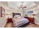 Comfortable bedroom featuring a ceiling fan, recessed lighting and luxury vinyl flooring at 4916 Locklear Way, Marietta, GA 30066