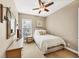 Relaxing bedroom with neutral walls, a ceiling fan, and lots of natural light from the window at 4916 Locklear Way, Marietta, GA 30066