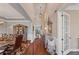 Formal dining room with elegant chandelier, tray ceiling, and classic decor at 4916 Locklear Way, Marietta, GA 30066