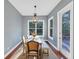 Charming dining area bathed in natural light with a rustic table, perfect for Gathering meals at 4916 Locklear Way, Marietta, GA 30066