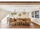 Formal dining room with two hanging chandeliers, hardwood floors and beautiful natural light at 4916 Locklear Way, Marietta, GA 30066
