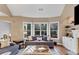 Bright living room featuring a bay window with tan walls and hardwood floors at 4916 Locklear Way, Marietta, GA 30066
