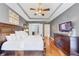 The main bedroom offers generous space, a decorative ceiling, and hardwood floors at 4916 Locklear Way, Marietta, GA 30066