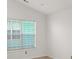 Neutral bedroom featuring blinds and ample natural light at 5180 Sterling Trace Nw Ct, Lilburn, GA 30047