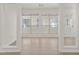 Living room featuring lots of windows and a view to other rooms at 5180 Sterling Trace Nw Ct, Lilburn, GA 30047