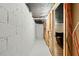 Basement area featuring exposed brick, with doorway leading to a cozy space at 215 Collum Nw St, Atlanta, GA 30314