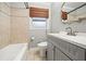 Bathroom features shower-tub combo and vanity sink at 215 Collum Nw St, Atlanta, GA 30314