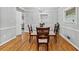 Dining room boasts chair rail and hardwood flooring at 215 Collum Nw St, Atlanta, GA 30314