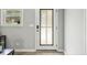 Entryway featuring a modern white door with glass panel and a window to the outside at 215 Collum Nw St, Atlanta, GA 30314