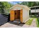 Outdoor storage shed with open doors; ample space for tools and equipment at 215 Collum Nw St, Atlanta, GA 30314