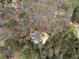 Secluded home nestled among trees with a private pool and well-maintained grounds at 2160 Bradley Trl, Cumming, GA 30041