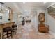 Spacious finished basement with tile flooring, sitting area, pool table and stairs at 2160 Bradley Trl, Cumming, GA 30041