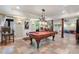 Recreational area with a pool table, access to the yard, natural light, and tile floors at 2160 Bradley Trl, Cumming, GA 30041