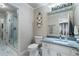 Beautiful bathroom featuring marble floors, a glass-enclosed shower, and white cabinets at 2160 Bradley Trl, Cumming, GA 30041