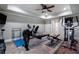 Well-equipped exercise room with various machines, a ceiling fan, and ample space for workouts at 2160 Bradley Trl, Cumming, GA 30041