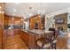Spacious kitchen with custom cabinetry, large island, and hardwood floors at 2160 Bradley Trl, Cumming, GA 30041