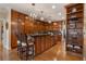 Gourmet kitchen with wood cabinets, a large island, and pendant lighting at 2160 Bradley Trl, Cumming, GA 30041