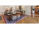 Cozy living room showcasing classic furnishings, hardwood floors, and a decorative area rug at 2160 Bradley Trl, Cumming, GA 30041
