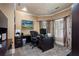 Cozy office with stylish decor, modern desk, and plantation shutters for a sophisticated workspace at 2160 Bradley Trl, Cumming, GA 30041
