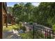 Backyard oasis with a sparkling pool, lush landscaping, and an inviting outdoor space at 2160 Bradley Trl, Cumming, GA 30041