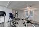 Finished basement with gym equipment and a walkout to enjoy the outdoors at 3253 Brookshire Way, Duluth, GA 30096