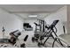 Finished basement offers ample space and an area for a home gym with workout equipment at 3253 Brookshire Way, Duluth, GA 30096