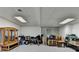 Finished basement featuring a display cabinet, exercise equipment, and storage at 3253 Brookshire Way, Duluth, GA 30096
