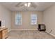 Inviting bedroom with plush carpeting and dual windows for ample lighting at 3253 Brookshire Way, Duluth, GA 30096