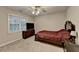 Carpeted bedroom with television and dresser, plus a window with blinds at 3253 Brookshire Way, Duluth, GA 30096