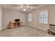 Bedroom with plush carpeting has natural light and ceiling fan at 3253 Brookshire Way, Duluth, GA 30096