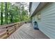 Spacious wooden deck with house exterior and surrounding greenery at 3253 Brookshire Way, Duluth, GA 30096