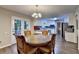 Charming dining area with views of the bright kitchen area at 3253 Brookshire Way, Duluth, GA 30096