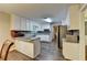 Bright kitchen featuring white cabinets, stainless steel appliances, and lots of counterspace at 3253 Brookshire Way, Duluth, GA 30096