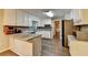 Bright kitchen featuring white cabinets, stainless steel appliances, and lots of counterspace at 3253 Brookshire Way, Duluth, GA 30096