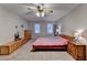 The main bedroom offers a ceiling fan, carpeted floors, and ample space for furniture at 3253 Brookshire Way, Duluth, GA 30096