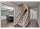 Carpeted staircase with wooden banister, leading to the upper level at 3253 Brookshire Way, Duluth, GA 30096