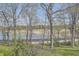 Beautiful lake and backyard foliage create a stunning, natural landscape and view at 489 Carter Se Ave, Atlanta, GA 30317
