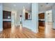 Spacious kitchen featuring dark wood cabinets, hardwood floors, and open access to other living spaces at 489 Carter Se Ave, Atlanta, GA 30317