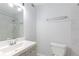 This is a bright bathroom featuring a modern sink, updated fixtures and a shower with sliding glass door at 1941 Brian Way # 1941, Decatur, GA 30033