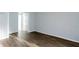 Bedroom with modern hard surface floors, neutral paint, and entry to a closet at 1941 Brian Way # 1941, Decatur, GA 30033