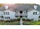 A multi-story residence with a meticulously maintained lawn and a picturesque walking path entrance at 1941 Brian Way # 1941, Decatur, GA 30033