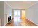 Spacious living room with a fireplace, wood floors and great light at 1941 Brian Way # 1941, Decatur, GA 30033