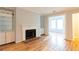 Cozy living room with fireplace, built-in storage, and natural light at 1941 Brian Way # 1941, Decatur, GA 30033