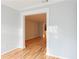 Spacious living room with hardwood floors, neutral paint, and entry to the hallway, all bathed in natural light at 1941 Brian Way # 1941, Decatur, GA 30033