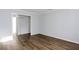 Bright living room featuring hardwood floors and neutral paint at 1941 Brian Way # 1941, Decatur, GA 30033