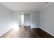 A bright living room with hardwood floors leads into the bathroom at 1941 Brian Way # 1941, Decatur, GA 30033