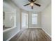Neutral dining room with wood floors, open to other living areas at 228 Roberts Trl, Locust Grove, GA 30248