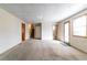 Spacious basement with carpet and access to a bathroom and staircase at 752 Alison Jane Ne Ct, Kennesaw, GA 30144